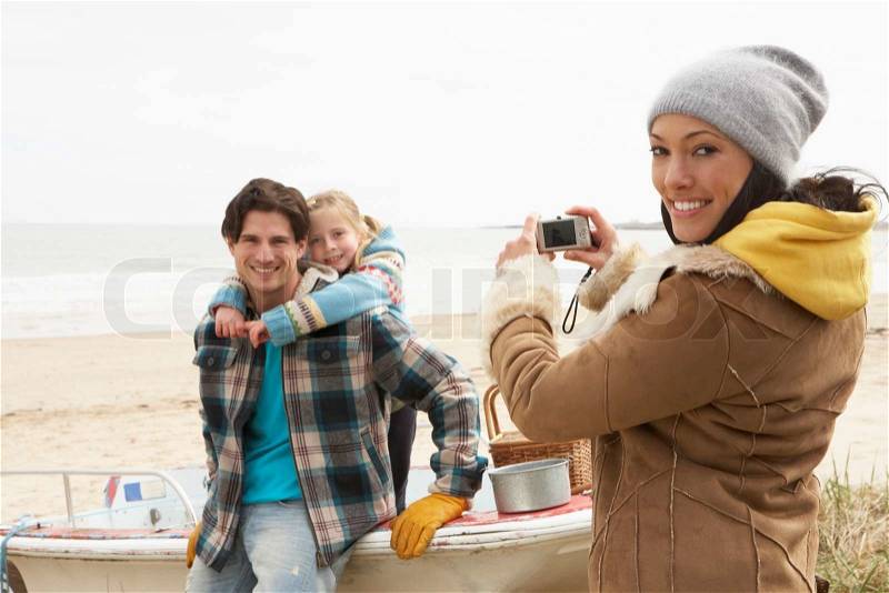  Family Picture Singapore on Stock Image Of  Mother Taking Family Photograph On Winter Beach