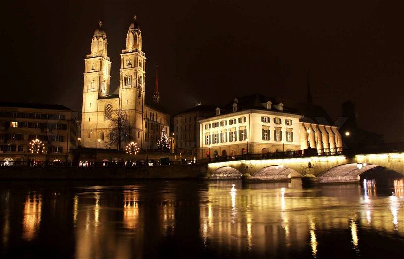 http://www.colourbox.com/preview/2563362-298456-view-to-grossmunster-church-and-zurich-downtown-at-night-switzerland.jpg
