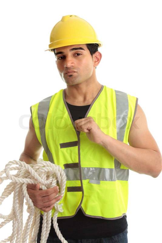 A male construction worker, builder, etc wearing protective clothing