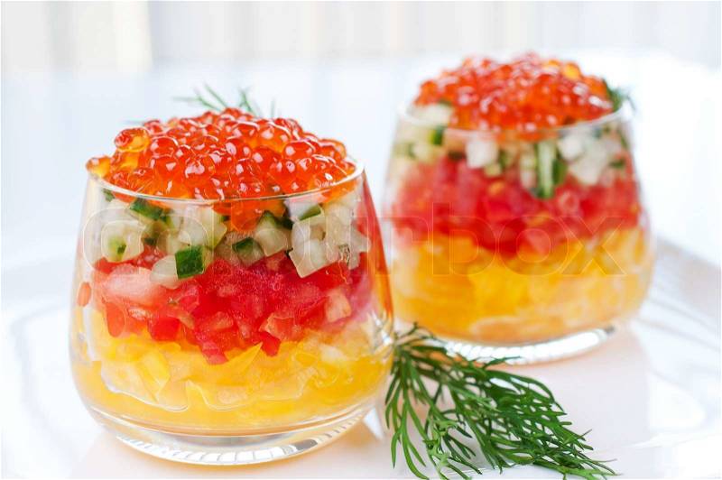 Stock image of 'Caviar with vegetable salad decorated sprig of dill on plate'