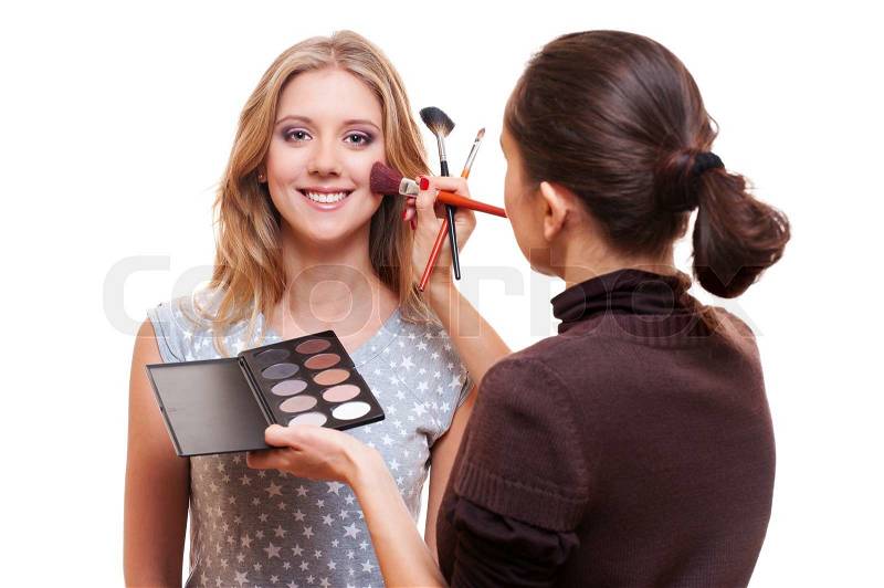 4061002-331487-professional-make-up-artist-working-with-model.jpg