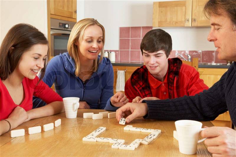 4315122-946308-family-playing-dominoes-in-kitchen.jpg