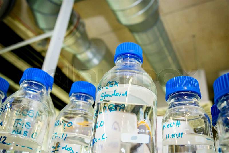 Glass bottles in a chemistry lab, stock photo