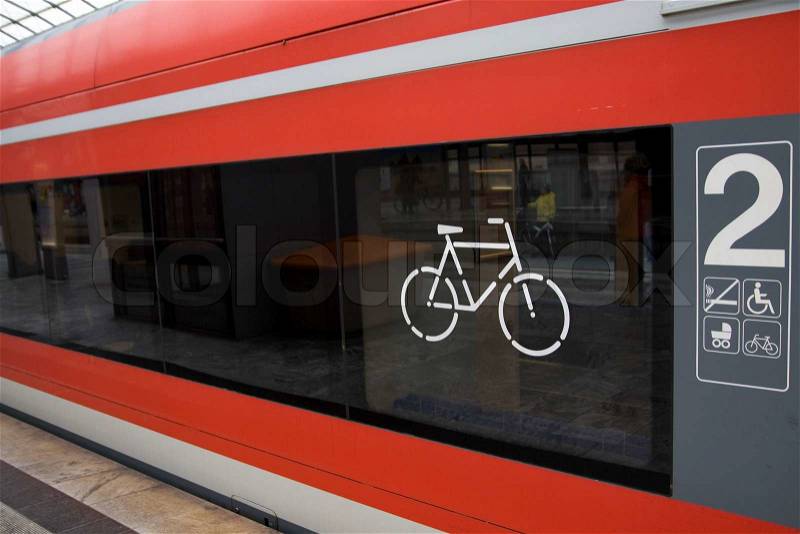 Sign of a bike painted on a train window, stock photo