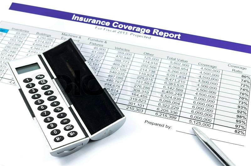 Insurance coverage report with calculator and pen for business, stock photo