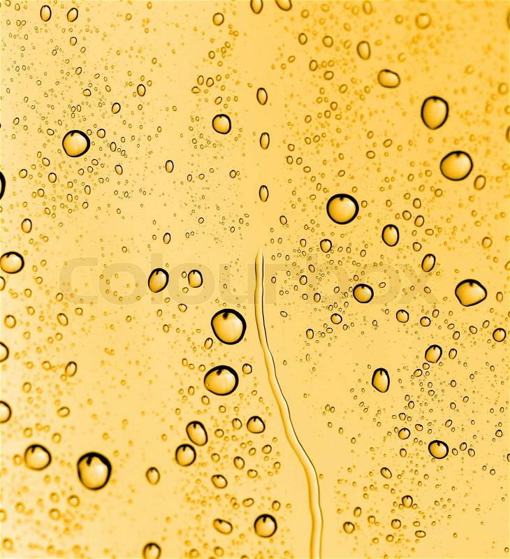 Water drops on glass with gold, stock photo