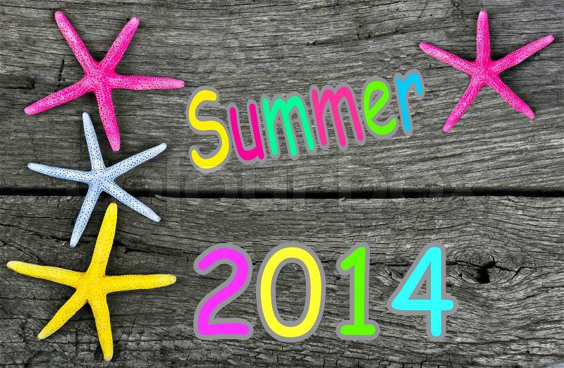 Summer 2014 background with starfish frame on vintage old wood, stock photo