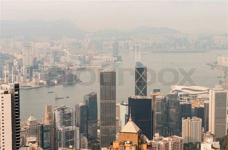 Hong Kong and Kowloon buildings. Aerial view of skyscrapers on a sunny afternoon, stock photo