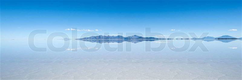 Salt lake Salar de Uyuni in Bolivia. The surface is about 10.000 square kilometers and it hides also the biggest Lithium reserve of the world, stock photo