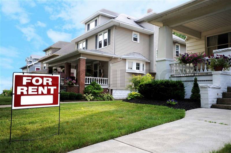 Home For Rent Sign in Front of Beautiful American Home , stock photo
