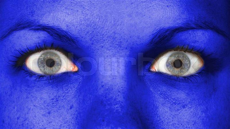 Women eye, close-up, blue eyes, blue skin, stock photo