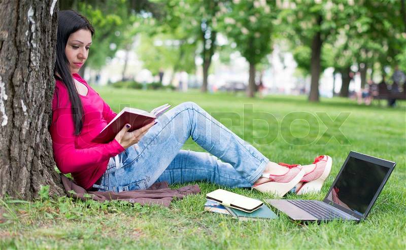 Beautiful girl reads book, summer, book, nature, school, stock photo
