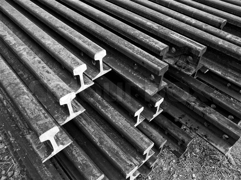 Roll of corroded railway steel beams, stock photo