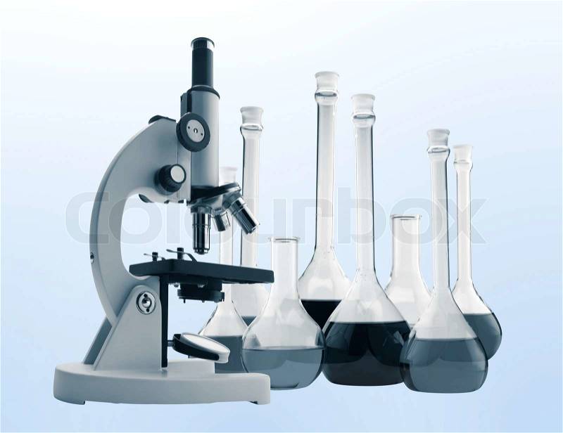 Laboratory metal microscope and test tubes with liquid toning in blue, stock photo