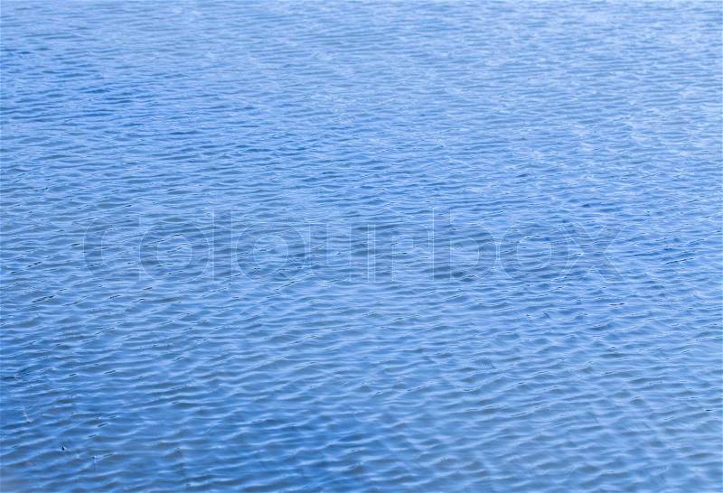 Close up of peaceful abstract blue water for background, stock photo
