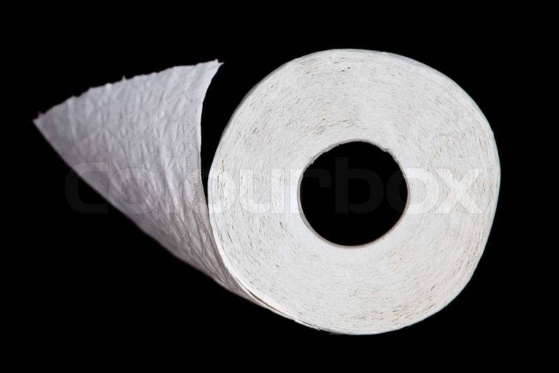 Roll of toilet paper on black background, stock photo