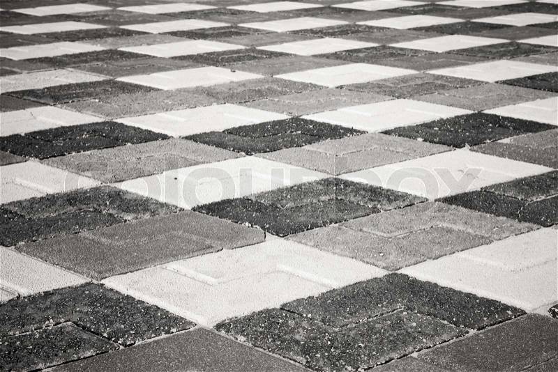 Black and white pattern of urban roadside pavement, stock photo