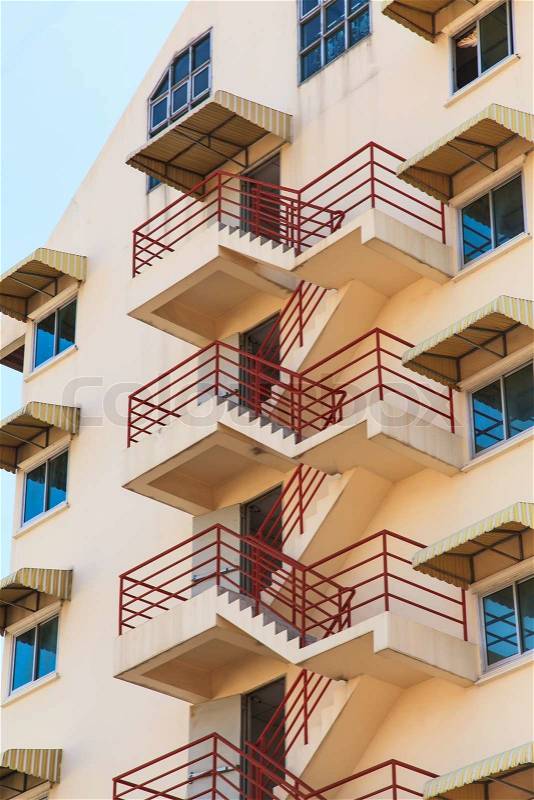 Fire escape ladder on the side of a building, stock photo