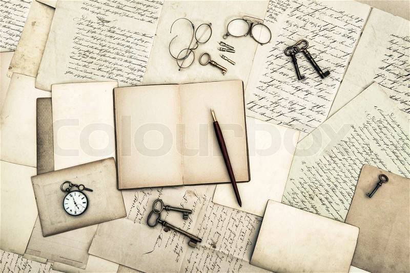 Antique office tolls and keys, old diary book and letters. nostalgic sentimental background, stock photo