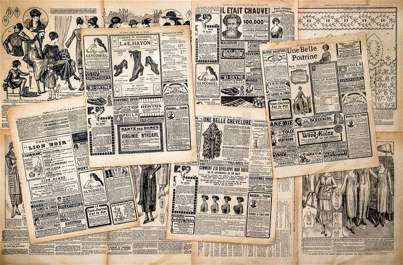 Newspaper pages with antique advertising. Woman\'s fashion magazine Le Petit Echo de la Mode from 1919, stock photo
