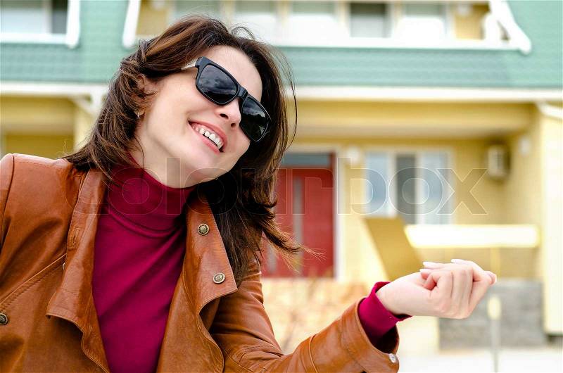 Candid Photo of a Woman in Shades on a sunny day, stock photo