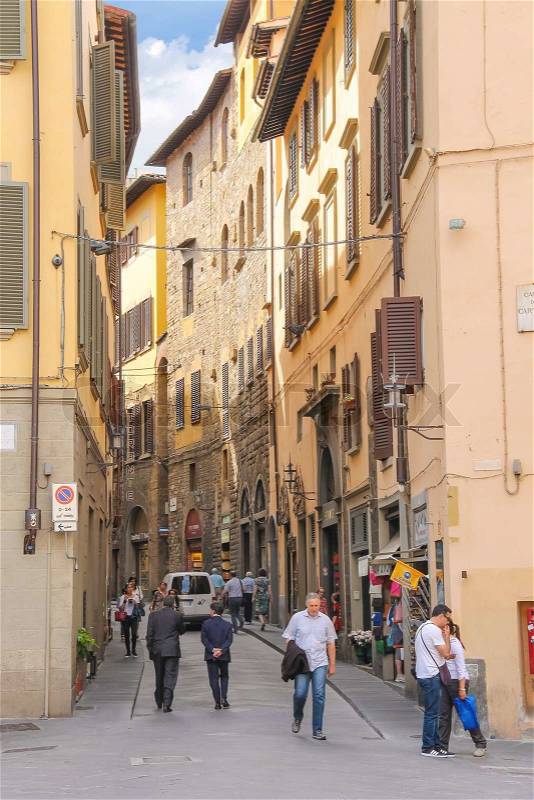FLORENCE, ITALY - MAY 08, 2014: People on the street of the ancient Italian city Florence. Florence - the administrative center of the region of Tuscany. Population of more than 373,000 people , stock photo