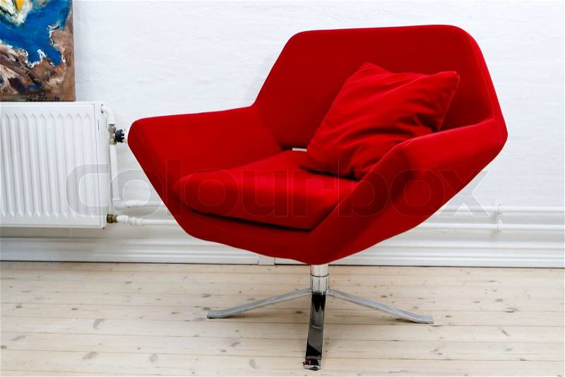 Modern red armchair, stock photo