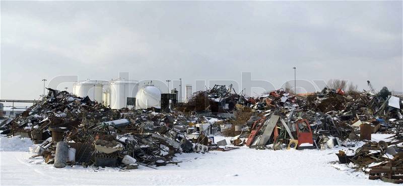 Scrap Metal and household waste at recycling facility, stock photo