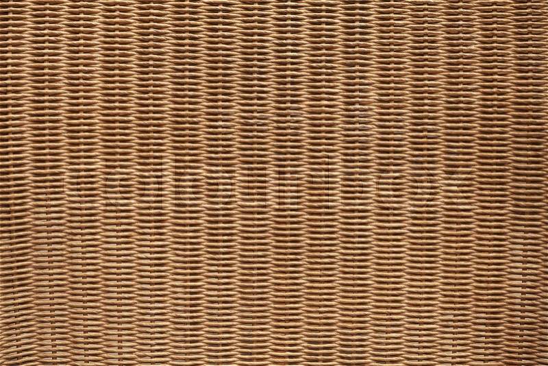 Brown wicker furniture surface. Background photo texture, stock photo