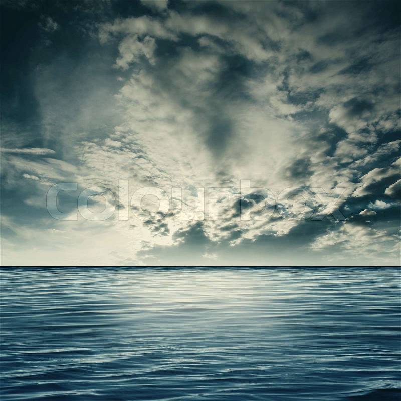 Dramatic sea, natural landscape with clouds and sea surface, stock photo
