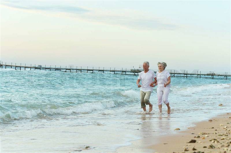 Older Couple On Beach