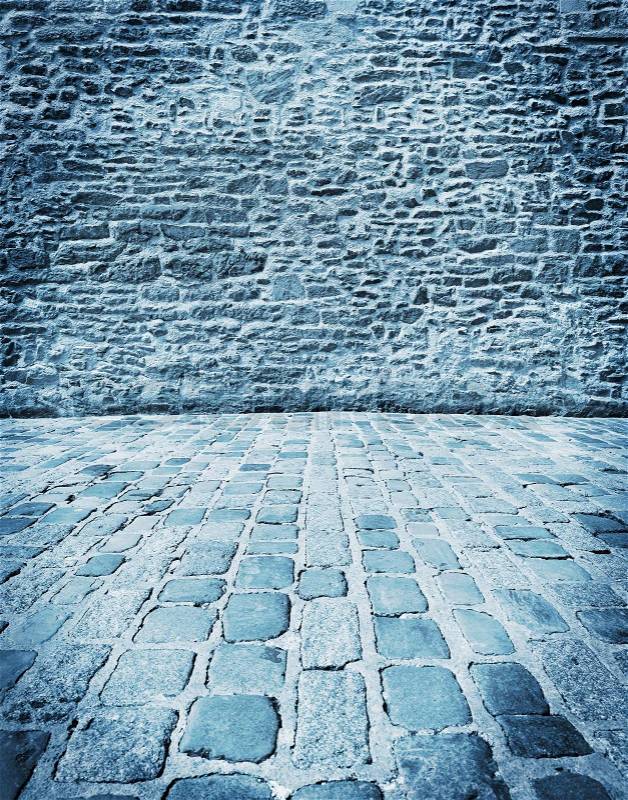 Old stone walls and floors of stone cubes, to use as a background, stock photo
