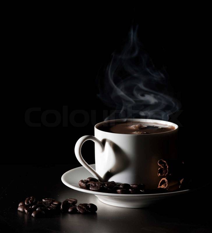 Coffee love. Warm cup of coffee on black background  Stock Photo 