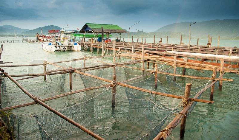 Fish cages on top view; fish cages in the river, Thailand, stock photo