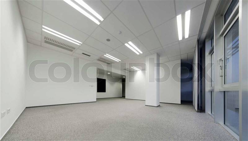 Tilt shift image of empty modern white office ready to rent, stock photo