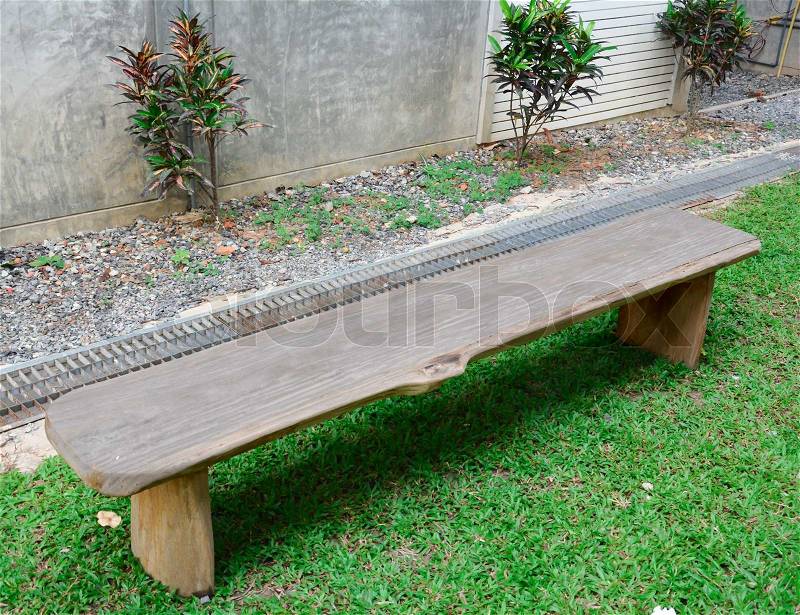 Wooden park bench in nature. A good place to sit, stock photo