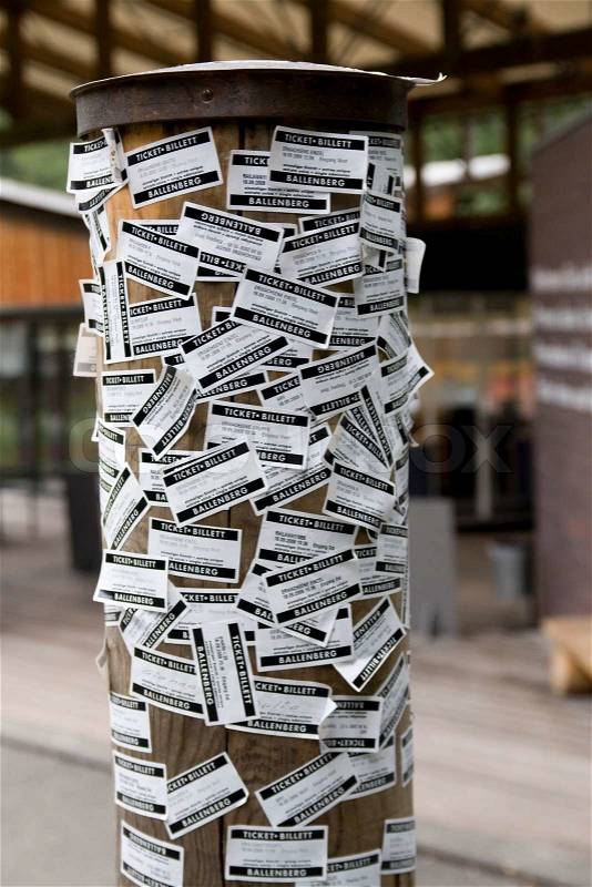Ads posted on a pole, stock photo