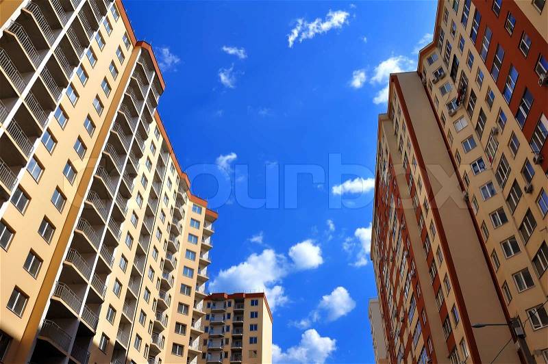 Two skyscraper on a sunny day with clouds, stock photo