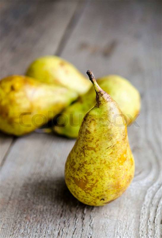 Yellow pears in a row, stock photo