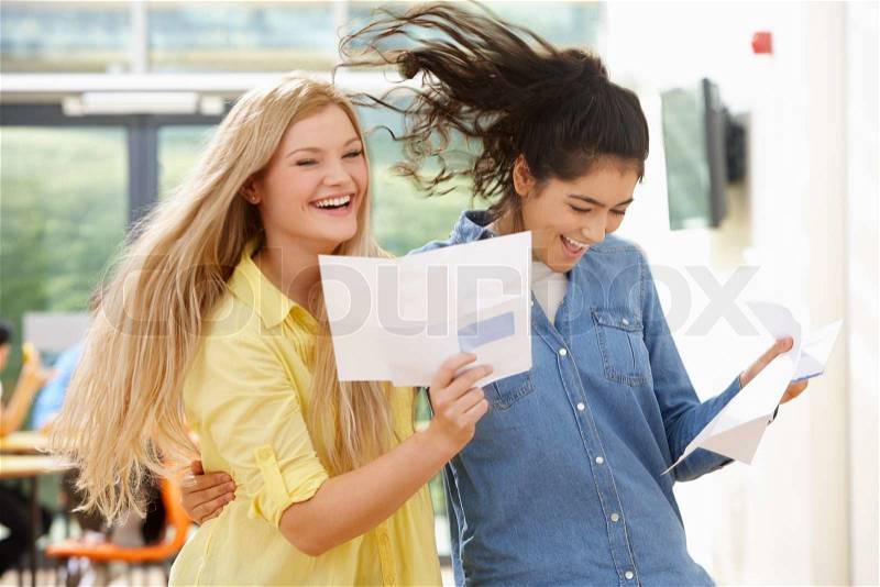 Two Teenage Pupils Celebrating Successful Exam Result, stock photo