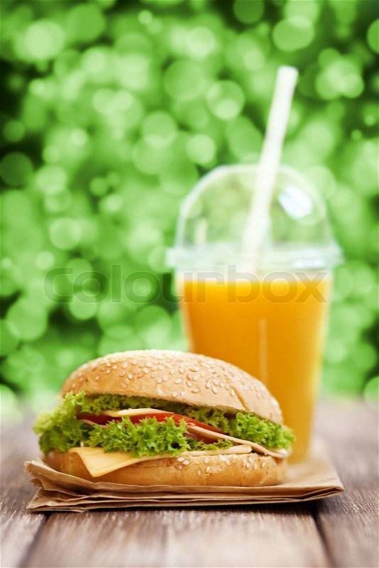 Fast food menu - hamburger and orange juice, stock photo