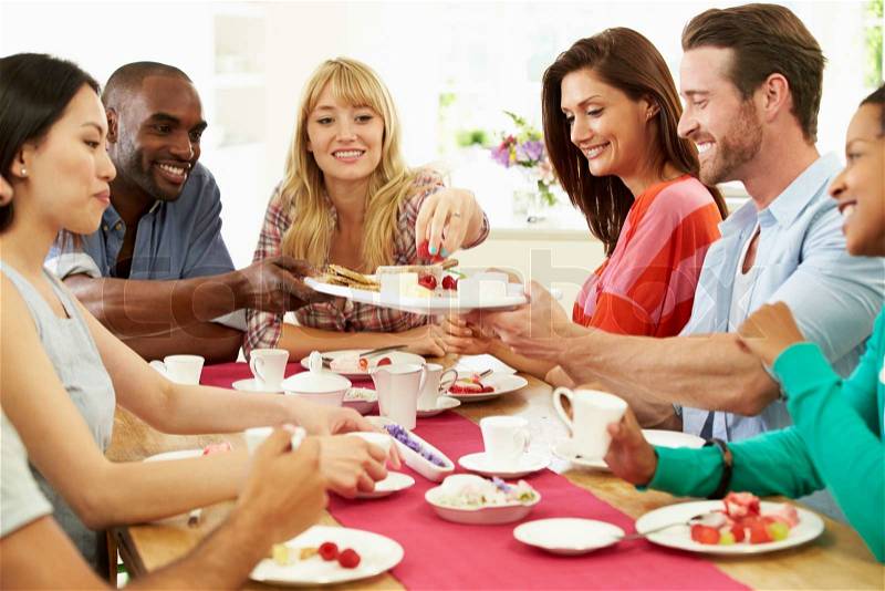 Group Of Friends Having Cheese And Coffee Dinner Party, stock photo