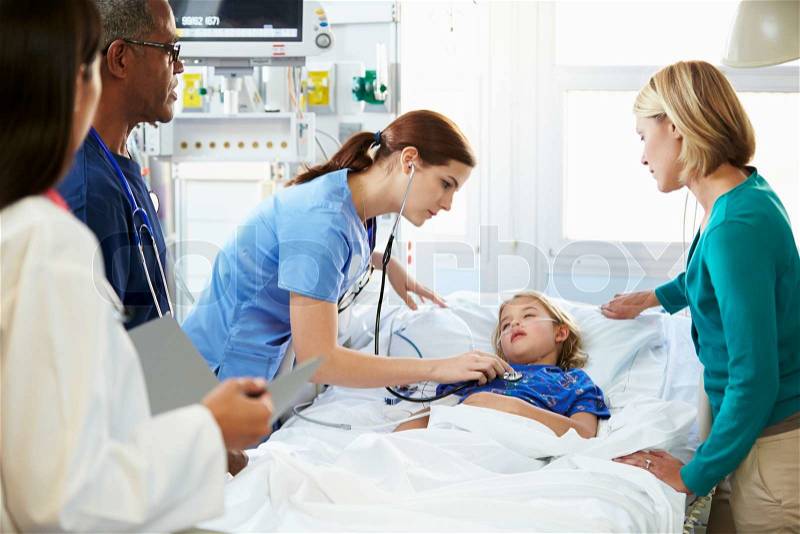 Mother And Daughter With Staff In Intensive Care Unit, stock photo