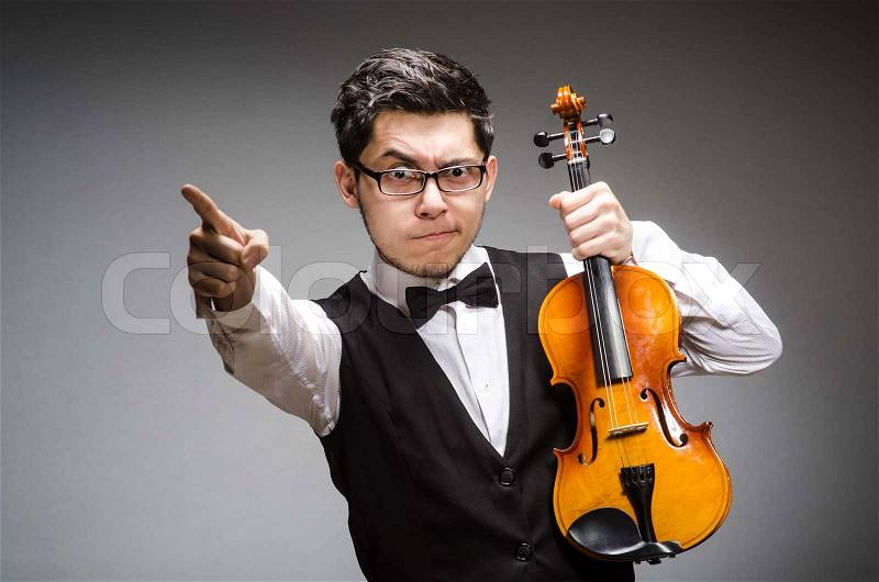 Funny violin player with fiddle, stock photo