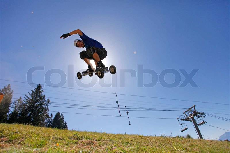 A rider jump with a montain board, stock photo