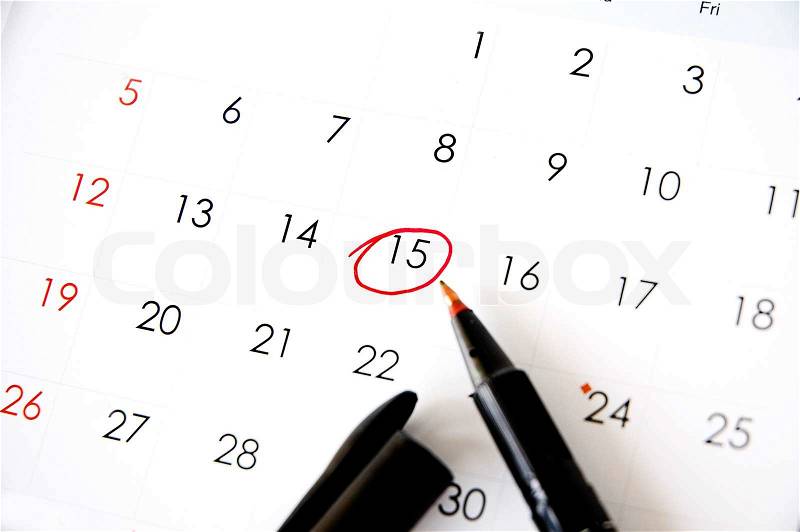 Red pen marked on date fifteen, stock photo