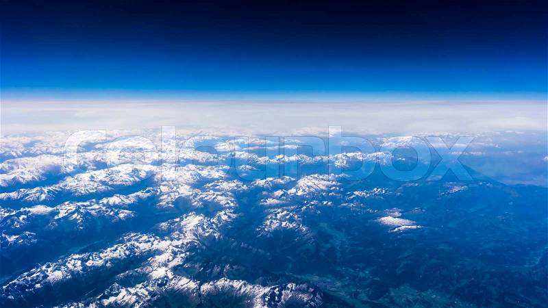 Landscape of Mountain. view from the airplane window . height of 10 000 km. view of blue sky, stock photo