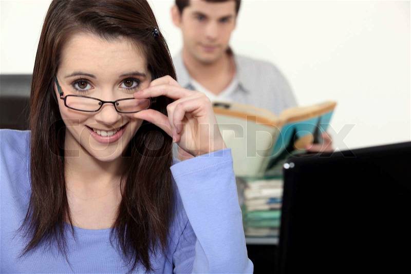 Two students in university class, stock photo