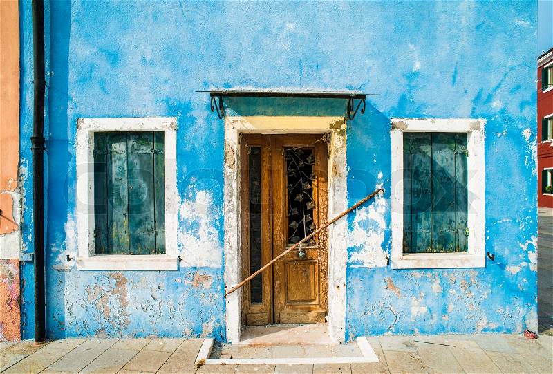 Bright blue color house in Burano, Venice, stock photo