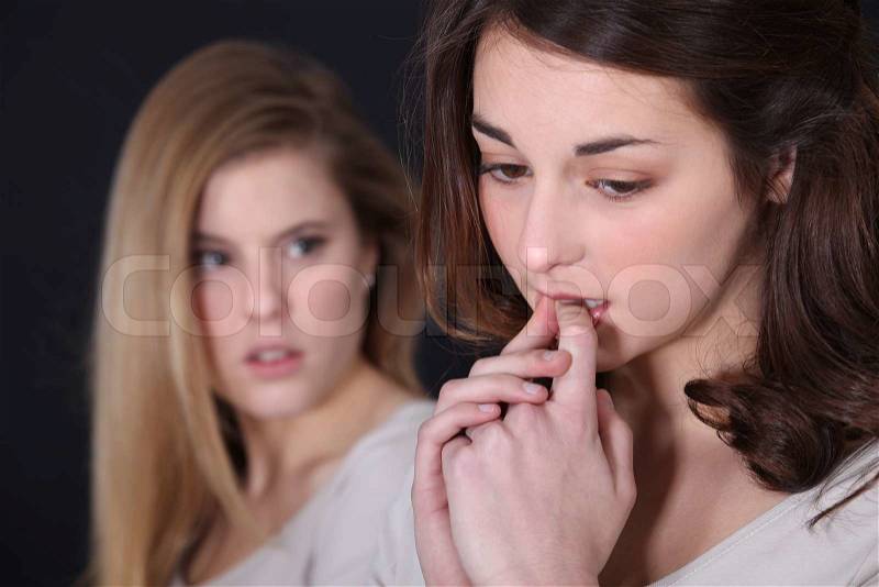 Sister upset after fight, stock photo